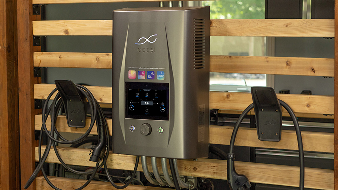 A sleek electric vehicle charging station mounted on a wooden wall, featuring a digital display and two coiled charging cables, representing smart energy devices and intelligent energy optimization for eco-conscious users.